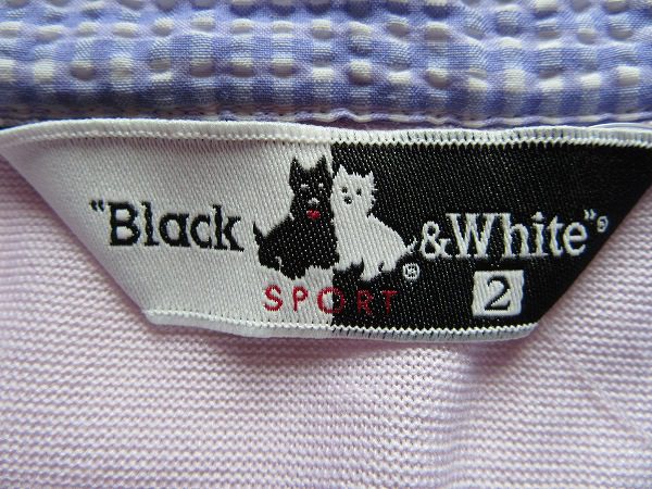 買取したウイスキーがブランド名の由来であるブラック＆ホワイトのポロシャツ