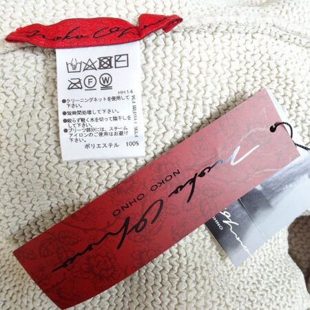 お買取したノコオーノのカーディガンのタグ
