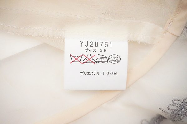 買取したノンノンドールのシースルーブラウスのタグ