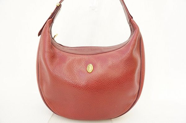 【カルティエ】気品高いボルドーが魅力のハンドバッグをお買取