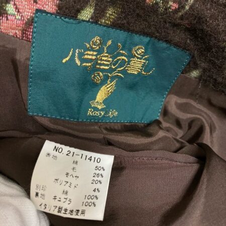 買取したバラ色の暮らしのロングコートのタグ