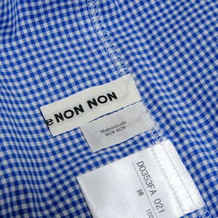 買取したマドモアゼルノンノンのギンガムチェック柄ワンピースのタグ