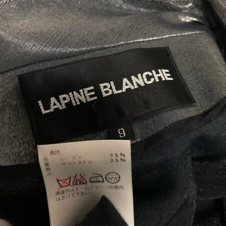 買取したラピーヌのシルバーカラーのベルト付きコートのタグ