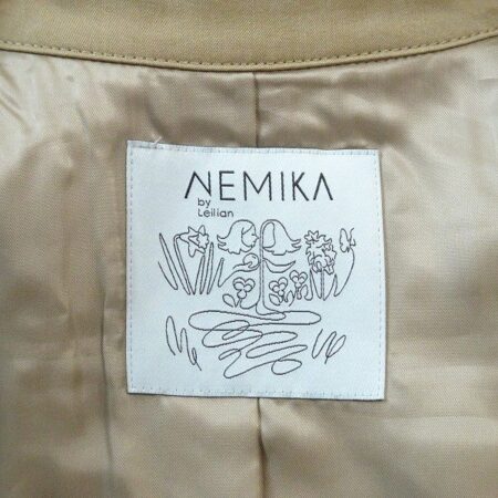 買取したネミカのトレンチコートのタグ