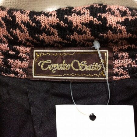 買取したサイトウトヨコの千鳥格子のポンチョのタグ